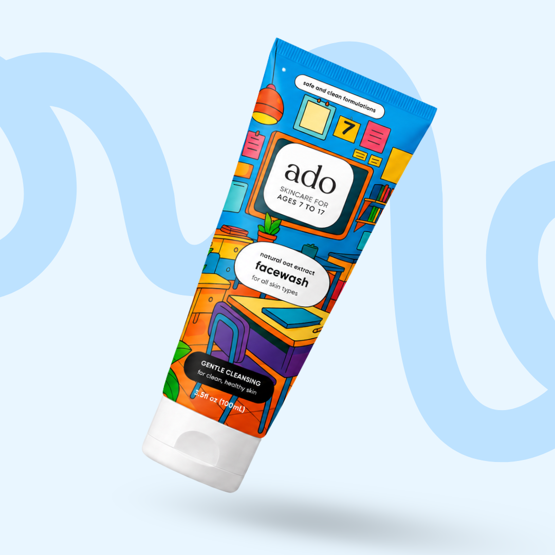 ado Gentle Oat Facewash tube with a colourful study-desk illustration, on a light blue background