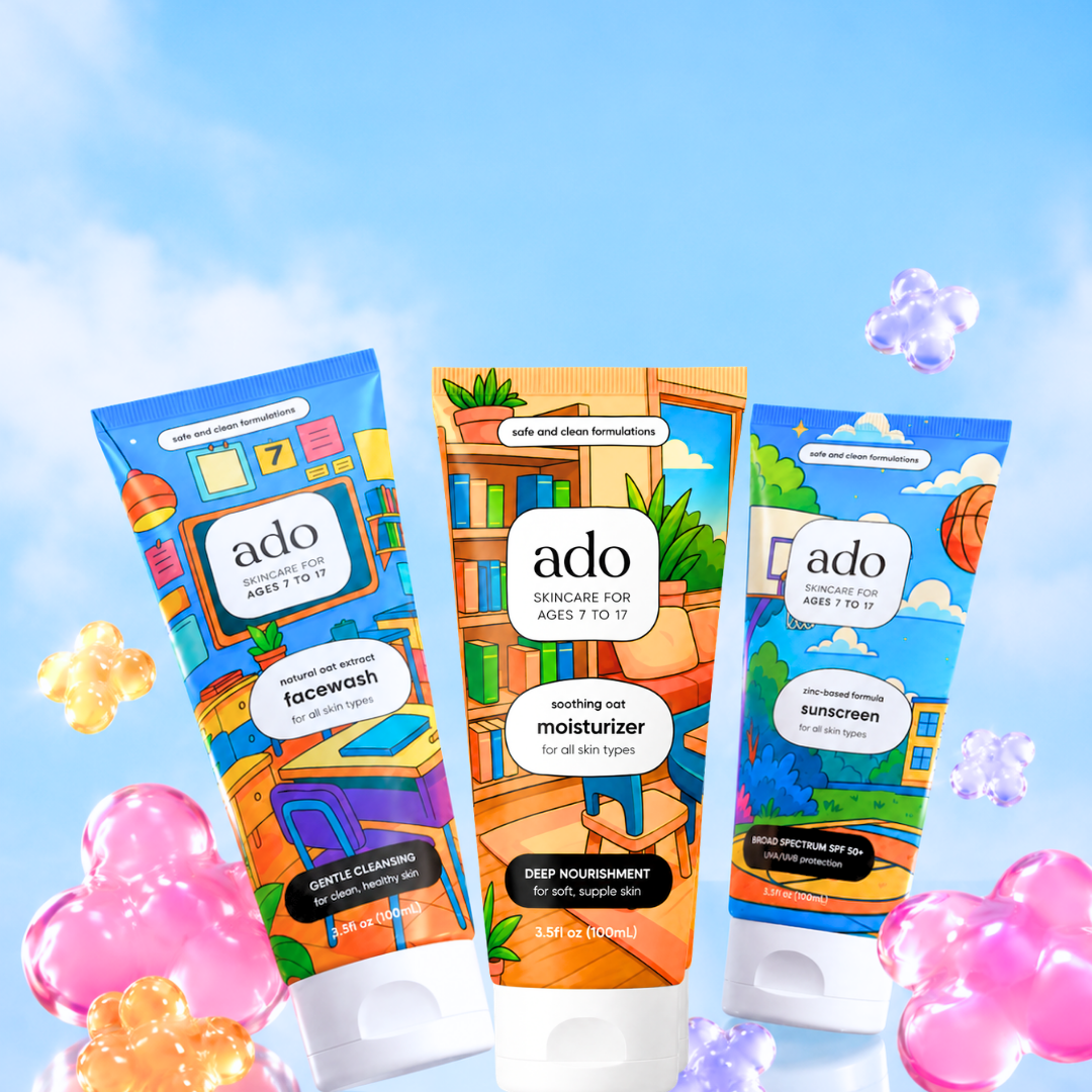 The ado facewash, moisturiser and sunscreen tubes floating among pastel gummy shapes against a blue sky